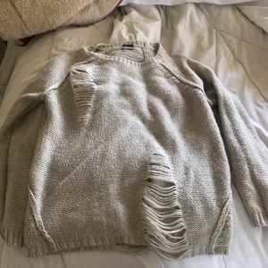 Sweater with holes